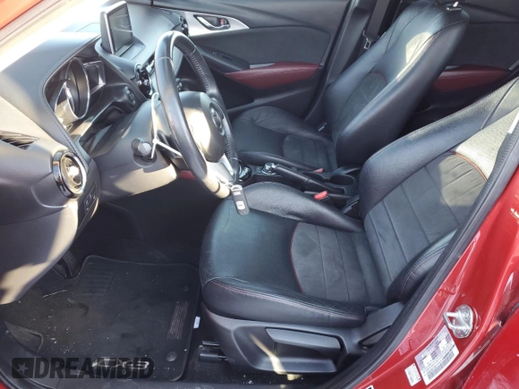 2016 Mazda CX-3 Grand Touring with VIN JM1DKBD78G0113185, listed as a Copart auction lot 42802145 with 158,068 mi miles and Salvage Title. Bid and sale history available at DreamBid. Image 7.