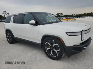 2023 Rivian R1S Adventure z VIN 7PDSGABA3PN024458, wystawiony jako Copart lot #74087714 z przebiegiem 3 505 mil mil oraz Nie do naprawy • Non repairable. Historia ofert i sprzedaży dostępna na DreamBid. Obrazek 4.