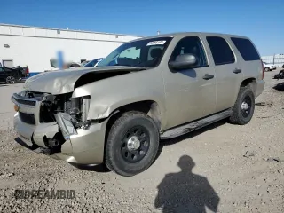 2014 Chevrolet Tahoe Commercial with VIN 1GNSK2E04ER118585, listed as a Copart auction lot 73708854 with 69,664 mi miles and Salvage title. Bid and sale history available at DreamBid. Image 1.