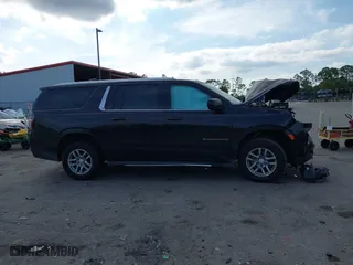 2021 Chevrolet Suburban LT with VIN 1GNSCCKD8MR269020, listed as a IAAI auction lot 41606337 with 108,305 mi miles. Bid and sale history available at carsss.com. Image 13.