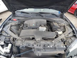 2016 BMW 2 Series 228i xDrive with VIN WBA1L9C5XGV767324, listed as a IAAI auction lot 41795604 with 133,276 mi miles. Bid and sale history available at carsss.com. Image 10.