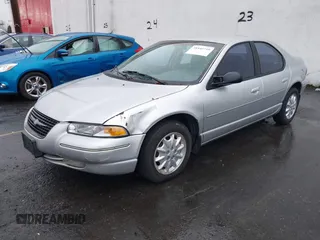 1999 Chrysler Cirrus LXi z VIN 1C3EJ56H2XN694821, wystawiony jako IAAI lot #38440710 z przebiegiem 103 787 mil mil oraz . Historia ofert i sprzedaży dostępna na DreamBid. Obrazek 2.