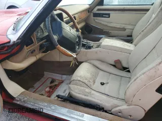 1996 Jaguar XJS with VIN SAJNX2747TC224957, listed as a Copart auction lot 76999844 with Not Provided miles and Salvage Title. Bid and sale history available at carsss.com. Image 7.