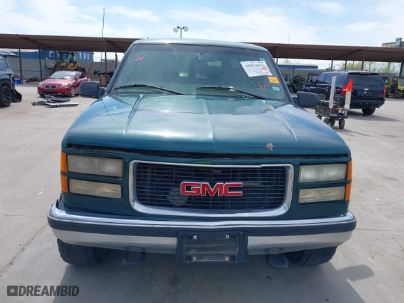 1998 GMC Suburban with VIN 1GKGK26J4WJ734958, listed as a IAAI auction lot 41878070 with 131,528 mi miles. Bid and sale history available at carsss.com. Image 12.