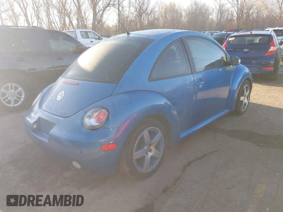 2004 Volkswagen New Beetle Coupe Satellite Blue with VIN 3VWGK31C84M420043, listed as a IAAI auction lot 41871049 with 251,646 mi miles. Bid and sale history available at carsss.com. Image 4.