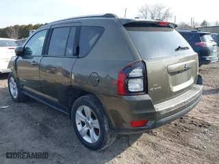 2015 Jeep Compass Latitude with VIN 1C4NJDEB1FD258100, listed as a IAAI auction lot 41773202 with 107,457 mi miles. Bid and sale history available at carsss.com. Image 3.