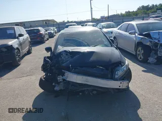 2015 Honda Civic Sedan EX-L with VIN 2HGFB2F97FH537234, listed as a IAAI auction lot 42002845 with 148,357 mi miles. Bid and sale history available at carsss.com. Image 6.