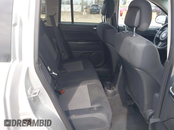 2012 Jeep Compass Sport with VIN 1C4NJDBB4CD624163, listed as a IAAI auction lot 42025783 with 148,928 mi miles. Bid and sale history available at carsss.com. Image 8.