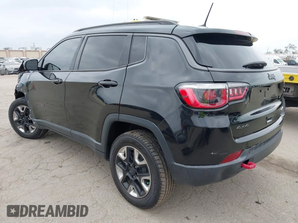 2018 Jeep Compass Trailhawk with VIN 3C4NJDDB3JT451658, listed as a IAAI auction lot 42087588 with 90,189 mi miles and . Bid and sale history available at DreamBid. Image 3.