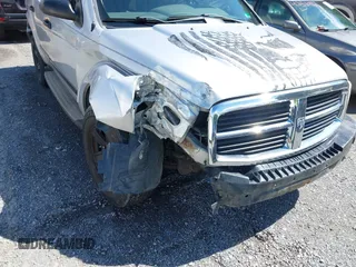 2004 Dodge Durango SLT with VIN 1D4HB48NX4F217582, listed as a IAAI auction lot 42511767 with 242,731 mi miles and . Bid and sale history available at DreamBid. Image 6.