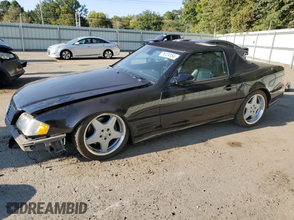 2001 Mercedes-Benz SL 500 with VIN WDBFA68FX1F196609, listed as a Copart auction lot 76124154 with 49,809 mi miles and Salvage title. Bid and sale history available at DreamBid. Image 1.