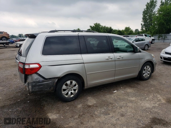 2007 Honda Odyssey EX with VIN 5FNRL38427B513477, listed as a Copart auction lot 62457695 with 216,977 mi miles and Salvage title. Bid and sale history available at DreamBid. Image 3.
