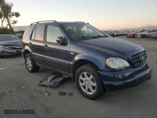 2001 Mercedes-Benz M-Class with VIN 4JGAB72E91A260677, listed as a Copart auction lot 89200235 with 180,414 mi miles and Salvage Title. Bid and sale history available at carsss.com. Image 4.