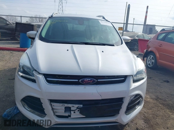 2015 Ford Escape Titanium with VIN 1FMCU9J98FUC76491, listed as a IAAI auction lot 41790638 with 158,196 mi miles and . Bid and sale history available at DreamBid. Image 12.