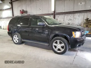 2013 Chevrolet Tahoe LT with VIN 1GNSKBE01DR288157, listed as a Copart auction lot 52665075 with 152,068 mi miles and Salvage Title. Bid and sale history available at DreamBid. Image 4.