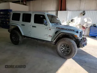 2024 Jeep Wrangler Rubicon X with VIN 1C4RJXFG5RW287542, listed as a Copart auction lot 72682924 with 5,792 mi miles and Salvage title. Bid and sale history available at DreamBid. Image 4.