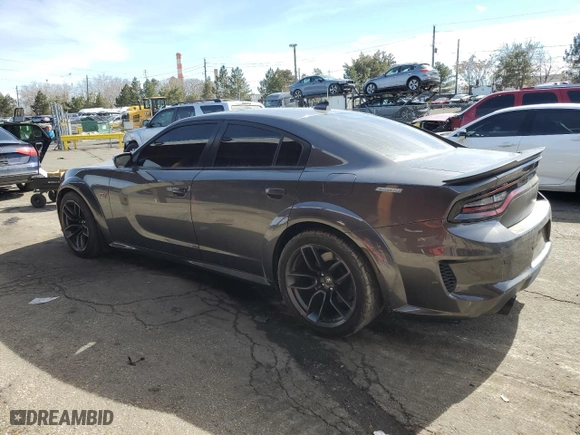 2021 Dodge Charger Scat Pack with VIN 2C3CDXGJ5MH602049, listed as a Copart auction lot 46069295 with 21,462 mi miles and Salvage Title. Bid and sale history available at carsss.com. Image 2.