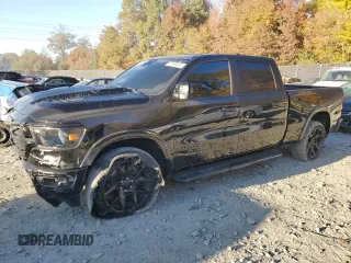 2022 Ram 1500 Laramie with VIN 1C6SRFRT4NN448547, listed as a Copart auction lot 77304354 with 34,371 mi miles and Salvage title. Bid and sale history available at DreamBid. Image 1.