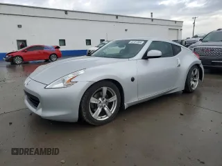 2009 Nissan 370Z Touring with VIN JN1AZ44E89M409220, listed as a Copart auction lot 43701504 with 145,099 mi miles and Salvage Title. Bid and sale history available at carsss.com. Image 1.