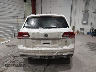 2019 Volkswagen Atlas SE z VIN 1V2XR2CA0KC595596, wystawiony jako IAAI lot #41410019 z przebiegiem 103 336 mil mil oraz . Historia ofert i sprzedaży dostępna na DreamBid. Obrazek 17.