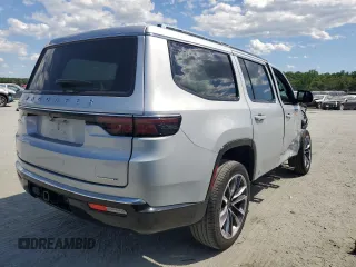 2023 Jeep Wagoneer Series II Carbide with VIN 1C4SJVBP1PS561660, listed as a Copart auction lot 57832565 with 17,715 mi miles and Salvage title. Bid and sale history available at DreamBid. Image 3.