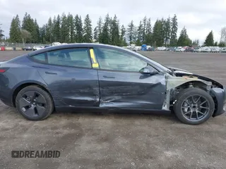 2023 Tesla Model 3 with VIN 5YJ3E1EA2PF623217, listed as a IAAI auction lot 41701413 with 21,246 mi miles and . Bid and sale history available at DreamBid. Image 14.