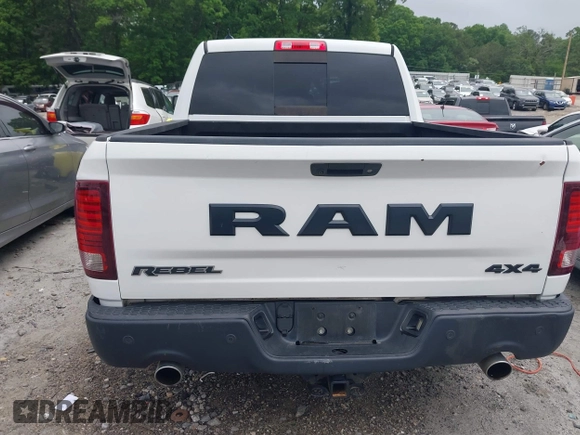 2017 Ram 1500 Rebel with VIN 1C6RR7YT7HS575529, listed as a IAAI auction lot 42125529 with 110,722 mi miles and . Bid and sale history available at DreamBid. Image 6.