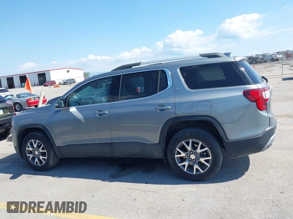 2023 GMC Acadia SLT with VIN 1GKKNML46PZ130813, listed as a IAAI auction lot 42614040 with 56,086 mi miles and . Bid and sale history available at DreamBid. Image 14.
