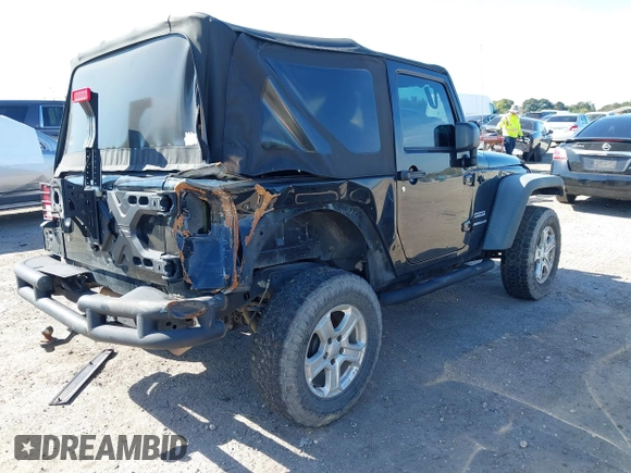 2016 Jeep Wrangler Willys Wheeler z VIN 1C4AJWAG9GL257621, wystawiony jako IAAI lot #41432306 z przebiegiem 84 248 mil mil oraz . Historia ofert i sprzedaży dostępna na DreamBid. Obrazek 4.