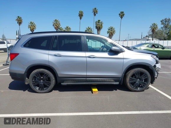 2021 Honda Pilot Special Edition with VIN 5FNYF6H27MB094704, listed as a IAAI auction lot 41953899 with 55,462 mi miles and . Bid and sale history available at DreamBid. Image 14.