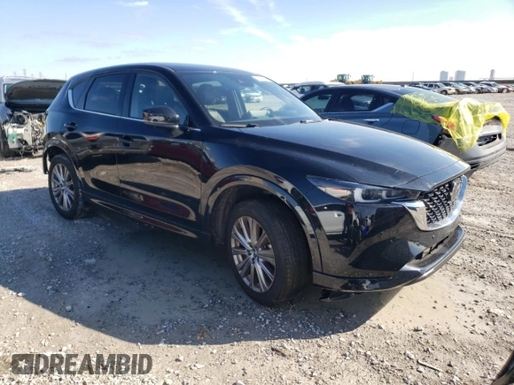 2023 Mazda CX-5 Signature with VIN JM3KFBXYXP0290991, listed as a Copart auction lot 41408485 with 19,952 mi miles and Salvage Title. Bid and sale history available at carsss.com. Image 4.