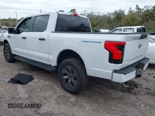 2024 Ford F-150 Lightning XLT with VIN 1FTVW3LKXRWG01185, listed as a IAAI auction lot 41679606 with 4,961 mi miles and . Bid and sale history available at DreamBid. Image 3.