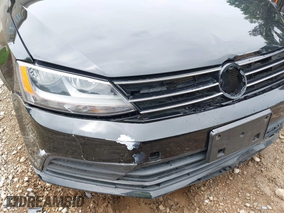 2017 Volkswagen Jetta S z VIN 3VW2B7AJ3HM303198, wystawiony jako IAAI lot #42651056 z przebiegiem 126 253 mil mil oraz . Historia ofert i sprzedaży dostępna na DreamBid. Obrazek 20.