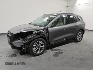 2021 Ford Escape SEL Hybrid z VIN 1FMCU9CZXMUA70082, wystawiony jako Copart lot #47012035 z przebiegiem 73 328 mil mil oraz Czysty tytuł • Clean title. Historia ofert i sprzedaży dostępna na DreamBid. Obrazek 1.