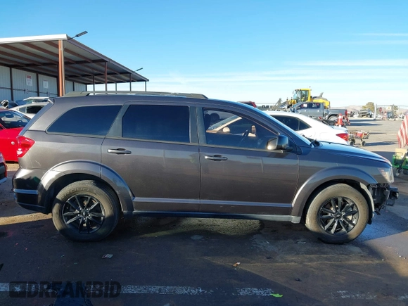 2019 Dodge Journey SE with VIN 3C4PDCBG7KT872888, listed as a IAAI auction lot 41390094 with 114,513 mi miles and . Bid and sale history available at DreamBid. Image 14.