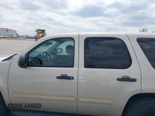 2013 Chevrolet Tahoe Commercial with VIN 1GNLC2E07DR266441, listed as a IAAI auction lot 42062162 with 133,321 mi miles and . Bid and sale history available at DreamBid. Image 14.