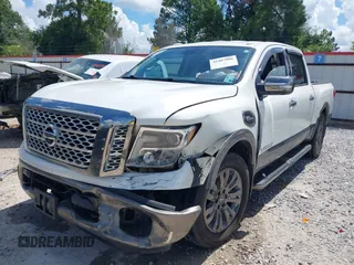 2017 Nissan Titan SV with VIN 1N6AA1E63HN526560, listed as a IAAI auction lot 42487006 with 155,505 mi miles and . Bid and sale history available at DreamBid. Image 2.
