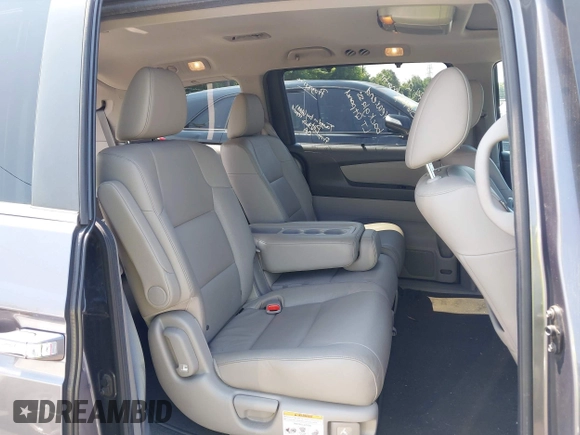 2014 Honda Odyssey EX-L with VIN 5FNRL5H63EB073585, listed as a IAAI auction lot 42673004 with 119,971 mi miles and . Bid and sale history available at DreamBid. Image 8.