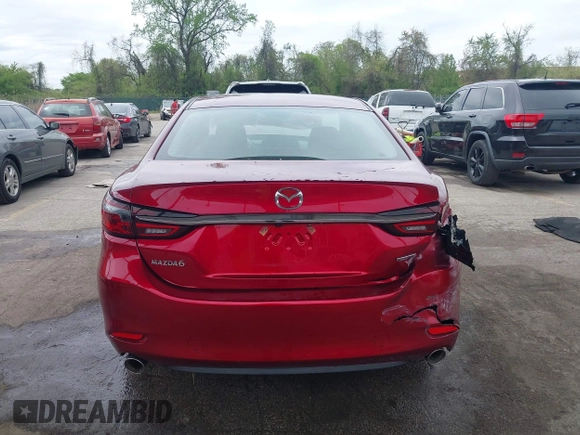 2020 Mazda 6 Sport with VIN JM1GL1UM9L1526019, listed as a IAAI auction lot 42092321 with 73,660 mi miles and . Bid and sale history available at DreamBid. Image 16.