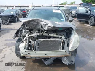 2015 Nissan Versa SV with VIN 3N1CN7APXFL830101, listed as a IAAI auction lot 41952806 with 144,354 mi miles. Bid and sale history available at carsss.com. Image 6.