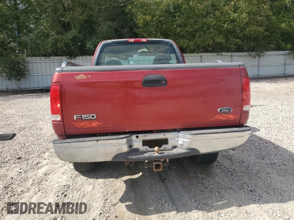 1999 Ford F-150 с VIN 1FTRF18W7XNB96181, выставлен на аукционе Copart как лот 76442364 с пробегом 143 813 миль миль и Списание • Salvage title. История ставок и продаж доступна на DreamBid. Изображение 6.