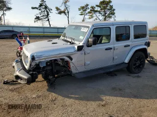 2024 Jeep Wrangler Sahara with VIN 1C4RJXP60RW128448, listed as a Copart auction lot 48658135 with 5,879 mi miles and Salvage Title. Bid and sale history available at DreamBid. Image 1.