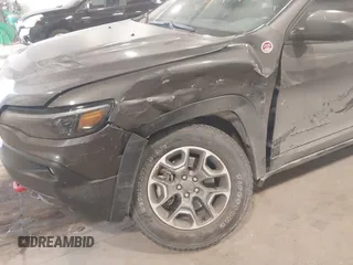 2020 Jeep Cherokee Trailhawk z VIN 1C4PJMBX8LD627104, wystawiony jako IAAI lot #41493732 z przebiegiem 46 463 mil mil oraz . Historia ofert i sprzedaży dostępna na DreamBid. Obrazek 6.