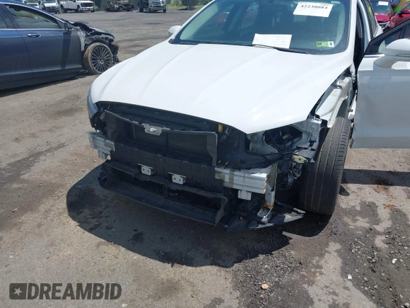 2015 Ford Fusion SE z VIN 3FA6P0H79FR166555, wystawiony jako IAAI lot #42238084 z przebiegiem 97 842 mil mil oraz . Historia ofert i sprzedaży dostępna na DreamBid. Obrazek 6.