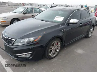 2013 Kia Optima SX with VIN 5XXGR4A63DG141938, listed as a IAAI auction lot 41760964 with 77,241 mi miles and . Bid and sale history available at DreamBid. Image 14.
