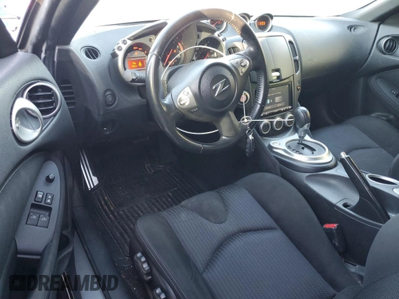 2010 Nissan 370Z Touring с VIN JN1AZ4FH0AM301069, выставлен на аукционе Copart как лот 82912404 с пробегом 55 803 миль миль и Списание • Salvage title. История ставок и продаж доступна на DreamBid. Изображение 8.