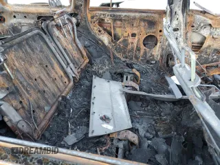 2002 Jeep Grand Cherokee z VIN 1J8GW38S72C159886, wystawiony jako Copart lot #77765704 z przebiegiem Nie podano mil oraz Szkoda całkowita • Salvage title. Historia ofert i sprzedaży dostępna na DreamBid. Obrazek 11.
