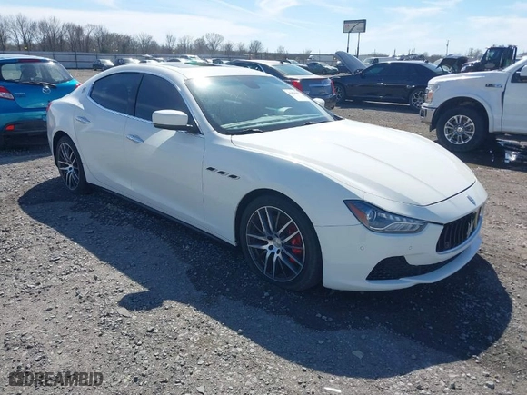 2014 Maserati Ghibli S Q4 with VIN ZAM57RTA2E1086502, listed as a IAAI auction lot 41826851 with 1 mi miles. Bid and sale history available at carsss.com. Image 1.