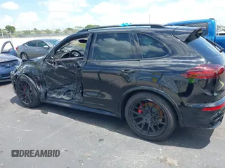 2016 Porsche Cayenne GTS z VIN WP1AD2A25GLA70430, wystawiony jako IAAI lot #42547008 z przebiegiem 108 374 mil mil oraz . Historia ofert i sprzedaży dostępna na DreamBid. Obrazek 14.