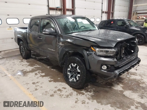 2021 Toyota Tacoma SR z VIN 3TMCZ5AN2MM444249, wystawiony jako IAAI lot #41942146 z przebiegiem 59 429 mil mil oraz . Historia ofert i sprzedaży dostępna na DreamBid. Obrazek 1.
